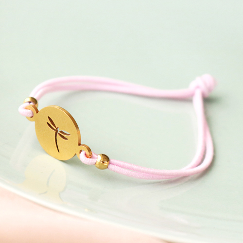 Need some inspiration? It's easy to make trendy bracelets out of elastic cord:
