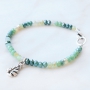 Colourful jewellery in soft pink and green shades faceted beads