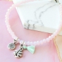 Colourful jewellery in soft pink and green shades faceted beads