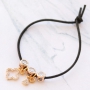 Create festive necklaces with pretty medallion, rhinestone and letter charms