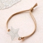 Bracelets and a keychain with bohemian pendants 