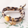 DIY bracelets made of stitched elastic ribbon