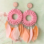 Festival jewellery inspiration with feathers and rattan pendants
