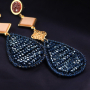 Make beautiful earrings in wintery colors with these facet pendants