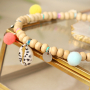 Check out how to make the best jewellery with Cowrie&rsquo;s and pompom charms:
