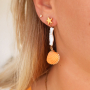 Necklaces and earrings with the latest collection of shell pendants: