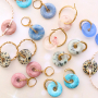 See here how to make beautiful earrings and bracelets with natural stone disc charms