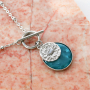 With the new brass TQ horoscope charms you can make these necklaces and earrings: