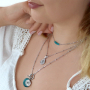 With the new brass TQ horoscope charms you can make these necklaces and earrings:
