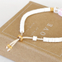 These cool summer bracelets can be made with letter beads and zodiac beads: 