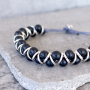 See here how you can make these cool bracelets with wooden beads yourself: 