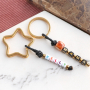 Get to work with our new acrylic letter beads and ceramic beads: 