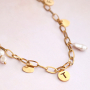 This is how you style the latest chain necklaces and chain bracelets: 