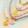 Get creative with these trendy plexx and DQ metal smiley charms