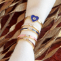 Combine these colourful rings and earrings with handmade jewellery