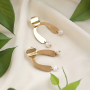 Earring inspiration with golden and silver charms and connectors