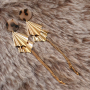 Earring inspiration with golden and silver charms and connectors