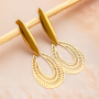 Get creative with stainless steel charms for statement earrings
