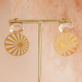 Get creative with stainless steel charms for statement earrings