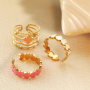 Assorted contemporay jewelry with different rings