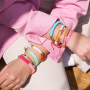 Inspiration for bracelets with acrylic beads, faceted beads and ribbon with text