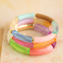 Inspiration for bracelets with acrylic beads, faceted beads and ribbon with text