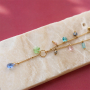 Creating statement necklaces with zirconia glass charms