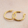 Tips for wearing statement stainless steel earrings