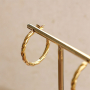 Tips for wearing statement stainless steel earrings