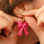 Jewellery inspiration with acrylic bow charms and heart earrings