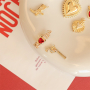 Create unique jewellery with hearts, country, and smiley charms