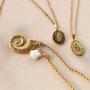 Design statement necklaces with stainless steel charms and pendants