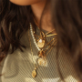 Design statement necklaces with stainless steel charms and pendants
