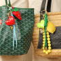 Create the cutest combos with our new bag charms