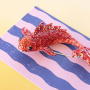 Mix & match with statement brooches