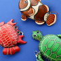 Create a beautiful collection with leather purses and keychains