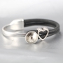 Nice stitched leather with beautiful findings and charms made of Designer Quality metal!