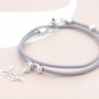 Trendy bracelets and earrings with Bohemian charms and fashionable beads