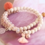 This summer look is made with the best beads in beautiful peach & coral shades. Love it!